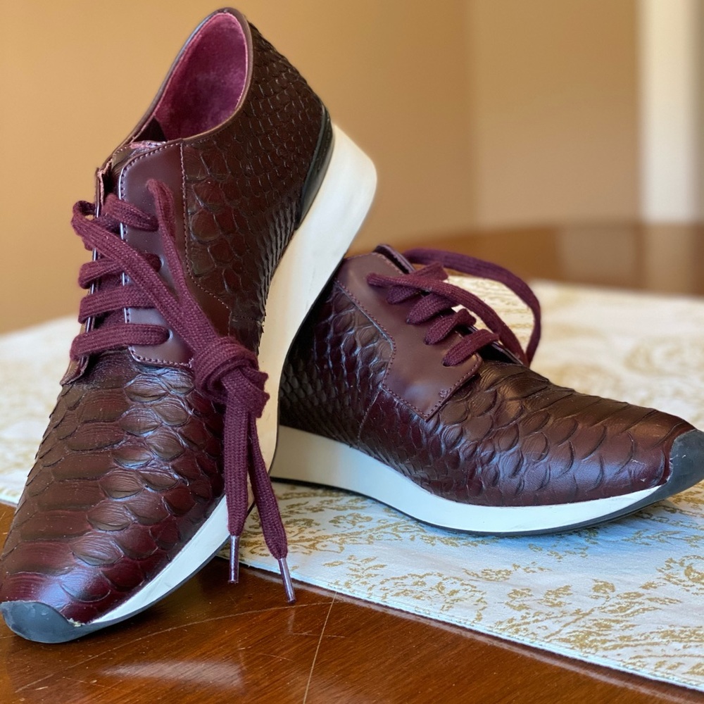 Vince maroon lizard textured leather loafer.